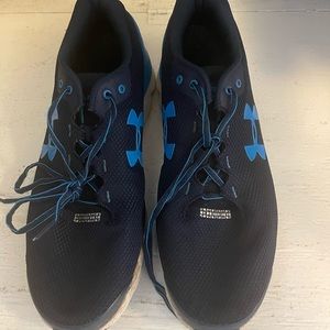 Barely worn Under Armour men’s tennis shoes.  Size 13.  Model unknown.
